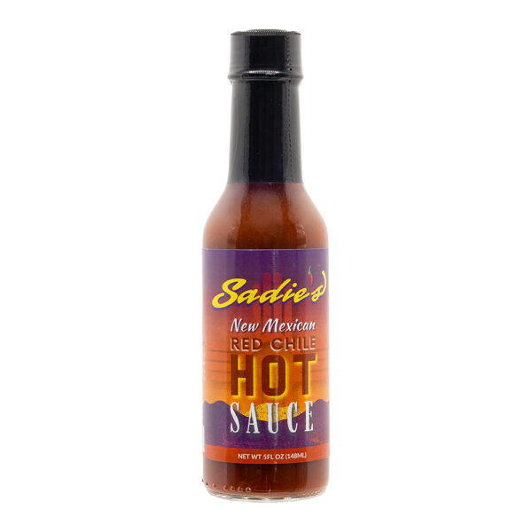 Sadie’s Red Chile Hot Sauce with Hatch Chiles for Smoky Heat and Tangy Kick on Tacos, Eggs, and More.